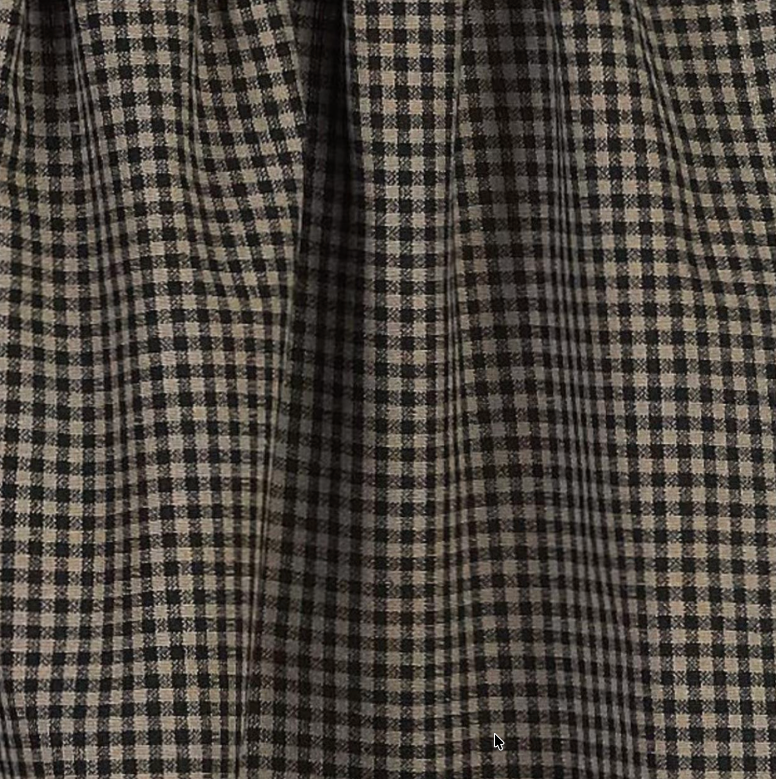 Close-up of a checkered fabric with black and beige pattern