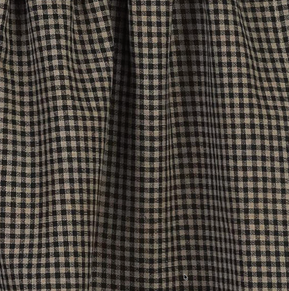 Close-up of a checkered fabric with black and beige pattern