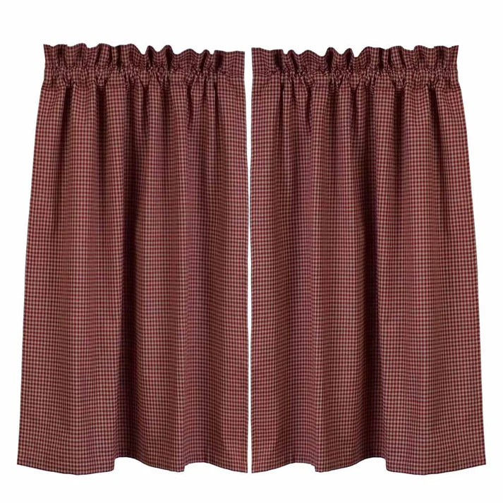 Pair of red checkered curtains on a white background